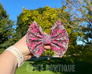 In october we wear pink cheetah bow